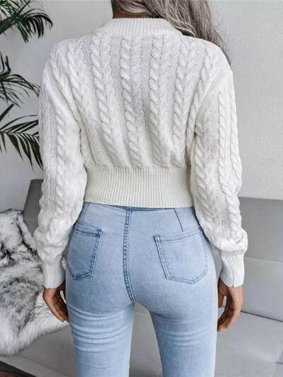 Cable-Knit Round Neck Cropped Sweater.