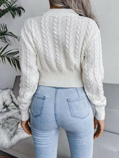 Cable-Knit Round Neck Sweater.