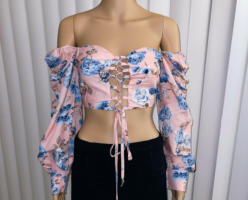 Jey B High fashion floral print blouse.