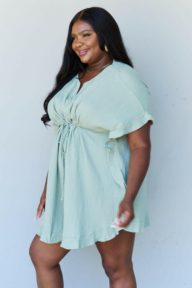 Ninexis Out Of Time Full Size Ruffle Hem Dress with Drawstring Waistband in Light Sage.