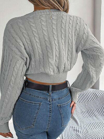 Twisted Cable-Knit V-Neck Sweater.